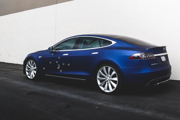 tesla shot at on fl turnpike, driver injured